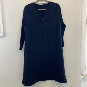Black long sleeved dress.